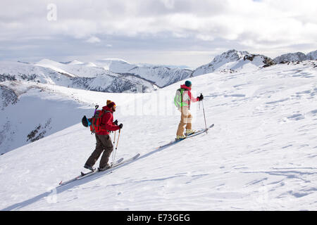 Two backcountry skiers in Pony, Montana. Stock Photo