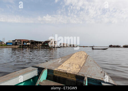 Africa, Benin, Ganvie. Looking out onto Lake Nokoue from bow of boat. Stock Photo