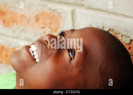 Kenya, Kakamega, portrait of smiling schoolboy in uniform (MR). Stock Photo