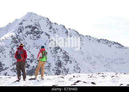 Two backcountry skiers in Pony, Montana. Stock Photo