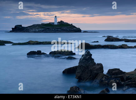 Godrevy Lighthouse which sits on an island off the north coast of Cornwall. Stock Photo