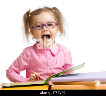 Funny kid girl in glasses with books speaking something isolated on white Stock Photo