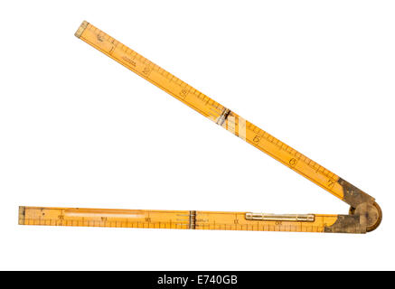 carpenter's folding rule of 19th century with brass level back view isolated on white with clipping path Stock Photo