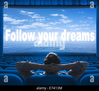 follow your dreams phrase on cinema screen Stock Photo