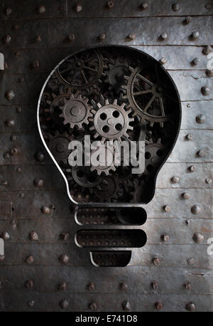 concept idea: bulb with working gears and cogs Stock Photo