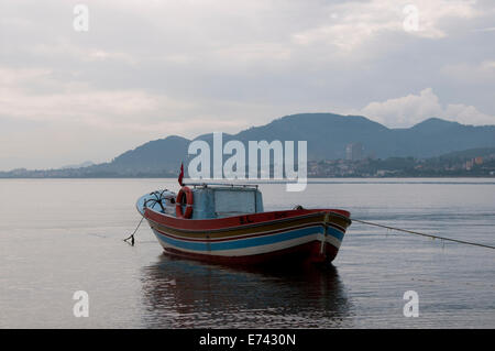 A fishing boat at the Black Sea town of Unye on the Turkish coast Stock Photo