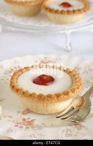 Cherry Bakewell tart a frangipane pastry selective focus on the cherry Stock Photo