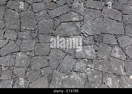 Gray Canarian natural stone wall Stock Photo