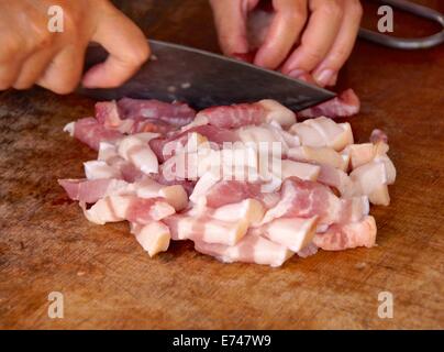 Cutting meat in the market Stock Photo