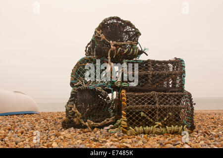 Lobster or crab pots on the shingle beach at Seaford Stock Photo