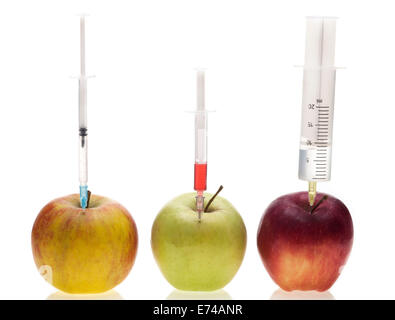 Genetic experiment with three different sorts of apples Stock Photo