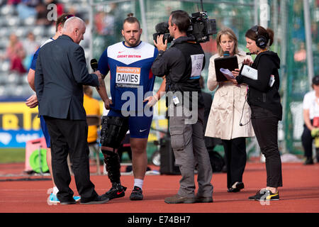 Aled Davies interviewed by Phil Jones of the BBC, men's Discus F42-44, 2014 IPC Birmingham Grand Prix, Alexander Stadium UK Stock Photo