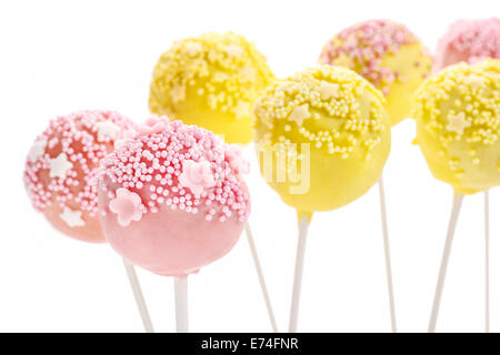 Pink and yellow cake pops isolated on white background. Party dessert Stock Photo