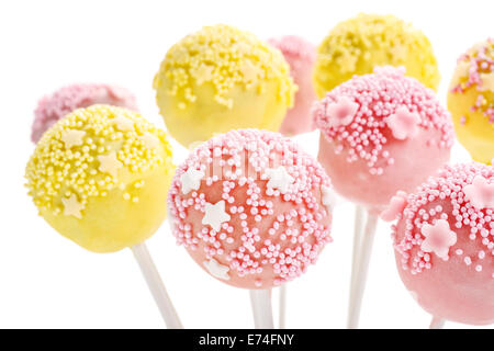 Pink and yellow cake pops isolated on white background. Party dessert Stock Photo