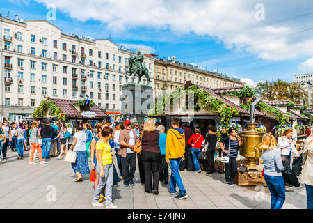 Moscow, Russia. Saturday, Sept. 6, 2014. The Moscow City Day is celebrated annually in the first Saturday of September. The city was founded in 1147 by prince Yuri Dolgorukiy (Long-handed). This year the city celebrates 867th birthday. Tverskaya square was converted into a fair and a recreational area. The monument to the prince Yuri Dolgorukiy (center). Credit:  Alex's Pictures/Alamy Live News Stock Photo