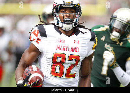 City, Florida, US. 6th Sep, 2014.Maryland Terrapins wide receiver Marcus Leak (82) runs the ball for a first quarter touchdown against the South Florida defense at Raymond James Stadium in Tampa on Saturday, September 6, 2014. South Florida is leading 17 to 14 at halftime. Credit:  Octavio Jones/Tampa Bay Times/ZUMA Wire/Alamy Live News Stock Photo