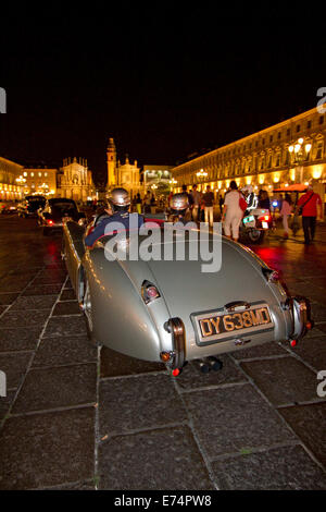 Torino, Italy. 6th September 2014. A parade of historical cars heads towards Piazza San Carlo. Collectors of historical cars met in Torino for a car elegance competition. Stock Photo