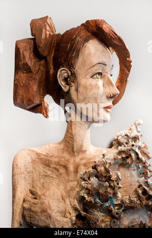 Wooden carving of a woman by Italian sculptor ENRICO CHALLIER (born 1974), on display in art gallery in Ghent, Belgium Stock Photo