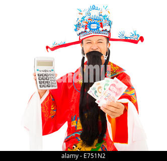 God of wealth holding a compute machine and chinese currency Stock Photo