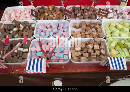 Flavoured fudge displayed at a sweet stall in England Stock Photo - Alamy