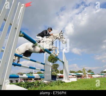 Burghley House, Stamford, UK. 7th Sep, 2014. Andrew Nicholson (NZL)  and his horse AVEBURY show jumping - Winner of the Land Rover Burghley Horse Trials, 7th September 2014. Credit:  Nico Morgan/Alamy Live News Stock Photo