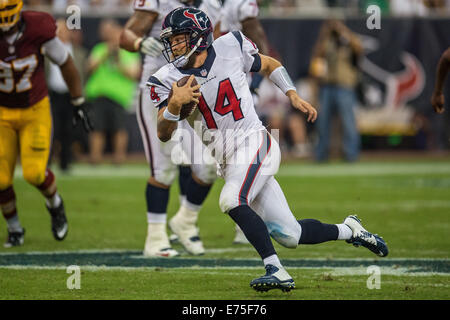 Houston, Texas, USA. 7th Sep, 2014. Houston Texans quarterback Ryan Fitzpatrick (14) runs for a 1st down during the 2nd half of an NFL game between the Houston Texans and the Washington Redskins at NRG Stadium in Houston, TX on September 7th, 2014. Credit:  Trask Smith/ZUMA Wire/Alamy Live News Stock Photo