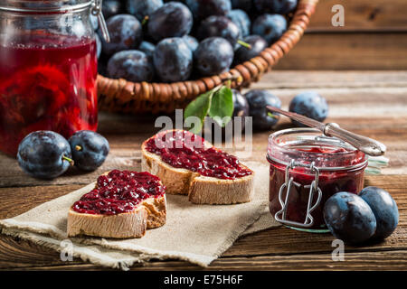 Sandwich with fresh plum jam Stock Photo