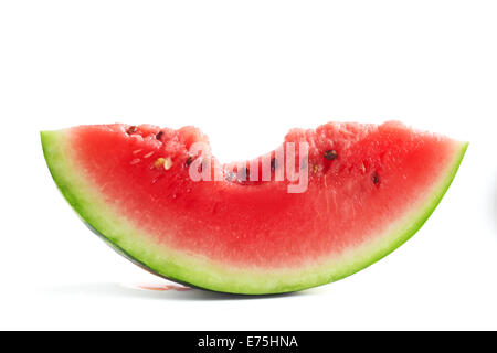 Slice of bitten watermelon isolated on white background Stock Photo