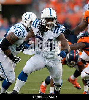 Denver, Colorado, USA. 7th Sep, 2014. Colts RB TRENT RICHARDSON, center, runs for tough yardage during the 1st. half at Sports Authority Field at Mile High Sunday night. The Broncos beat the Colts 31-24. Credit:  Hector Acevedo/ZUMA Wire/Alamy Live News Stock Photo