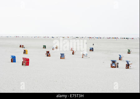 Roofed wicker beach chairs on the beach, Nebel, North Frisian Islands, Amrum, Schleswig-Holstein, Germany Stock Photo