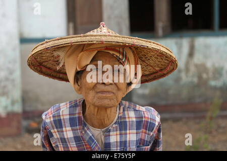 Old female farmer wearing a hat, Yangon, Myanmar Stock Photo