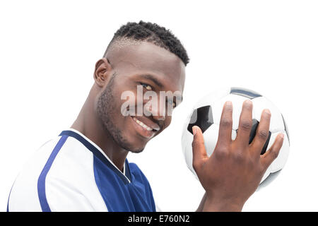 Close up portrait of a smiling handsome football player Stock Photo