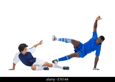 Football players in action Stock Photo