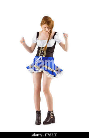 Oktoberfest girl moving and dancing Stock Photo