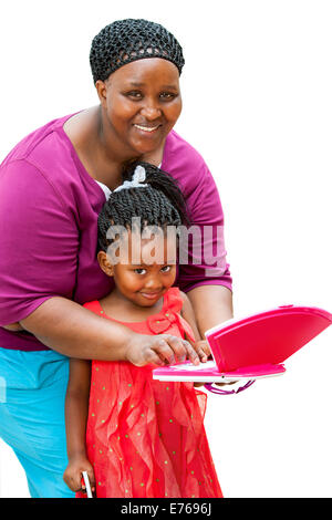 Close up portrait of African tutor helping girl with homework on laptop.Isolated on white background. Stock Photo