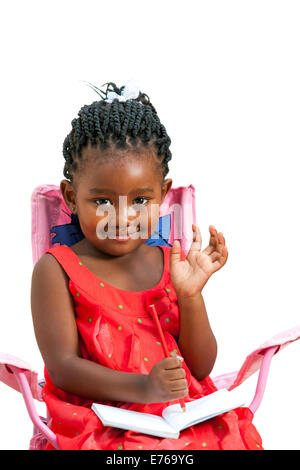 Portrait of sweet African girl with note book waving hand.Isolated on white background. Stock Photo