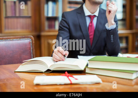 Lawyer doing research in chambers Stock Photo
