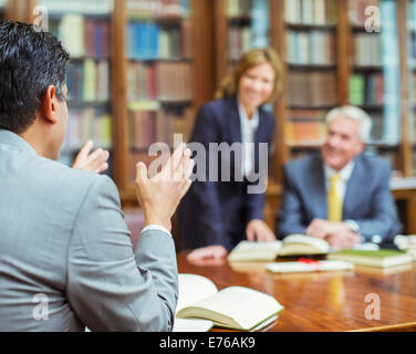 Lawyers talking in chambers Stock Photo