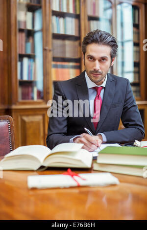 Lawyer doing research in chambers Stock Photo