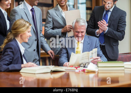 Lawyers examining documents in chambers Stock Photo