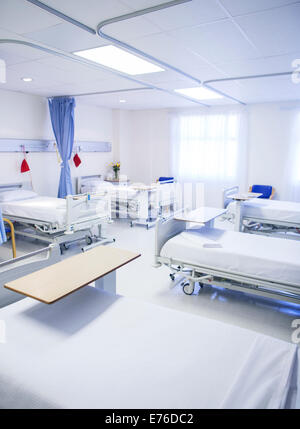 Empty beds in hospital room Stock Photo