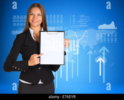 Businesswoman with graphs, arrows and world map Stock Photo