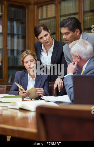 Lawyers talking in chambers Stock Photo