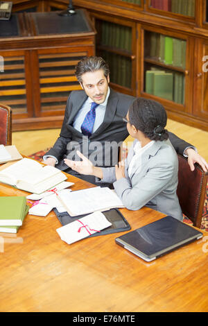 Lawyers talking in chambers Stock Photo