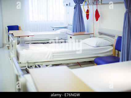 Empty beds in hospital room Stock Photo