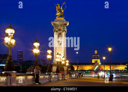 PARIS, FRANCE - AUGUST 6TH 2014: The view on Pont Alexandre III looking towards Les Invalides in Paris on 6th August 2014. Stock Photo