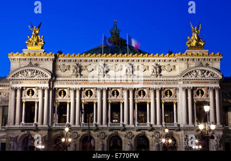 The magnificent Palais Garnier at dusk in Paris, France.  The Palais is a 1,979-seat Opera House built for the Paris Opera. Stock Photo