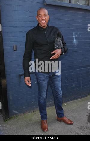 Celebrities and sports personalities arrive at a Sport Relief recording of the England 2014 World Cup song  Featuring: Dion Dublin Where: London, United Kingdom When: 05 Mar 2014 Stock Photo