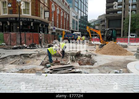 View of ROADWORKS enhancement project on Chiswell,  Whitecross & Silk Streets in the Barbican Area of London England UK Great Britain   KATHY DEWITT Stock Photo