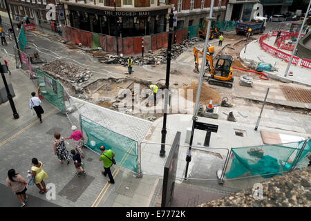 View of ROADWORKS enhancement project on Chiswell, Whitecross & Silk Streets Barbican Area London UK  KATHY DEWITT Stock Photo